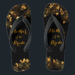 Mother of the Bride Luxury Black & Gold Foliage Jandals<br><div class="desc">These gorgeous Mother of the Bride Luxury black and gold foliage flip flops boasts a luxurious black and gold palette, with a stunning golden floral pattern and modern typography set against a black background, exuding elegance and sophistication. It's a beautiful gift for your bridal party. View the collection on this...</div>