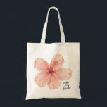 Mother of the Bride Pink Hibiscus Flower Tote Bag<br><div class="desc">Hand painted pink and peach hibiscus flower,  done in watercolors,  with "Mother of the Bride" text in fun script font.  A great wedding day go bag!</div>