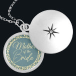 Mother of the Bride with Blue and Cream Leaves Locket Necklace<br><div class="desc">This beautiful locket is a special accessory designed for the Mother of the Bride. The locket features a classic blue and cream colour scheme with a cream-coloured leaf pattern inside, adding a touch of elegance and natural beauty. The hidden message inside is a special touch that will make this locket...</div>