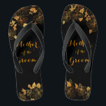 Mother of the Groom Luxury Black & Gold Foliage Jandals<br><div class="desc">These gorgeous Mother of the groom black and gold foliage flip flops boasts a luxurious black and gold palette, with a stunning golden floral pattern and modern typography set against a black background, exuding elegance and sophistication. It's a beautiful gift for your bridal party. View the collection on this page...</div>