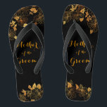 Mother of the Groom Luxury Black & Gold Foliage Jandals<br><div class="desc">These gorgeous Mother of the groom black and gold foliage flip flops boasts a luxurious black and gold palette, with a stunning golden floral pattern and modern typography set against a black background, exuding elegance and sophistication. It's a beautiful gift for your bridal party. View the collection on this page...</div>