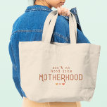 Motherhood Funny Modern Typography Mum Mother Large Tote Bag<br><div class="desc">Motherhood Simple Modern Typography Mum Mother Large Tote Bags features the text "Ain't no hood like Motherhood" in simple trendy modern typography accented with cute love hearts. Perfect for mum for Mother's Day,  birthday,  Christmas and more. Designed by ©Evco Studio www.zazzle.com/store/evcostudio</div>