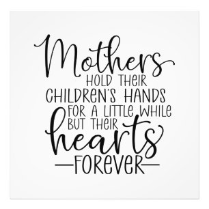 Mothers hold their children’s hand for a little  photo print