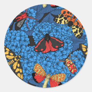 Moths on blue hydrangea classic round sticker