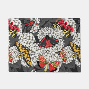Moths on white hydrangea doormat