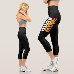 Motivational Black With Yellow Typography Capri Leggings<br><div class="desc">Black capri leggings with motivational quote "Mind over miles". Minimalist print in bright tones of white, yellow and orange on a black background. The word "running" (on the waist) is CUSTOMIZABLE, you can edit the font and colour or just replace it with a sport, a name, it's your choice! Great...</div>