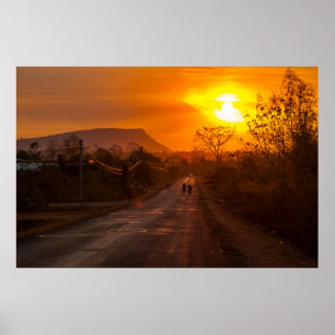 Motorbiking in sunset poster