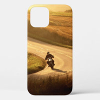 Motorcycle on countryside road at autumn evening.