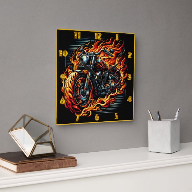 Motorcycle racing through flames at dusk square wall clock (Office)