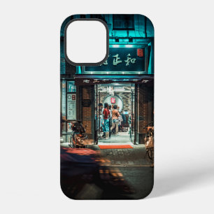 MOTORCYCLES AND PEOPLE PASSING BY AT NIGHT TIME iPhone 12 CASE