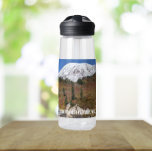Mount Rainier National Park Scenery Water Bottle<br><div class="desc">Stay quenched wherever you go with this clear,  plastic water bottle that features a scenic photo image of snow capped Mount Rainier and a stream as viewed from within the national park. Select your water bottle size and colour. NOTE: Design not optimised for Kid's water bottle style.</div>