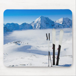 Mountains and ski equipment mouse pad