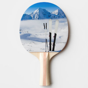 Mountains and ski equipment ping pong paddle