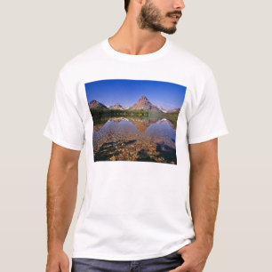 Mountains reflect into calm Two Medicine Lake in T-Shirt