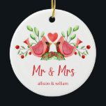 Mr and Mrs Cardinal Lovebirds Personalised Ceramic Tree Decoration<br><div class="desc">Decorate your tree with this "Mr and Mrs" design, featuring a pretty watercolor of two red cardinals. The lovebirds are face to face, perched on seasonal evergreens with a heart in between them. Underneath "Mr and Mrs" is written in fun modern typography and you can personalise with the couple's first...</div>