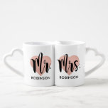 Mr and Mrs Rose Gold Heart Custom Wedding Monogram Coffee Mug Set<br><div class="desc">Personalised monogram coffee mugs make a unique wedding gift for the new Mr and Mrs! This minimalist design features modern black script writing,  a rose gold heart background,  and custom text that can be personalised with the newlywed couple's married last name.</div>