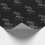 Mr & Mrs Classic Script Calligraphy Name Wedding Wrapping Paper<br><div class="desc">A modern classic and simple 'Mr. and Mrs.' white calligraphy script design with names that can be personalised, on a black background. The background colour can be changed to any colour of your choice. More font styles and editing features available within the product customisation page. This custom wrapping paper is...</div>