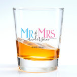 Mr & Mrs Newlywed Wedding Favour Shot Glass<br><div class="desc">Celebrate your holy matrimony with this cute Mr. and Mrs. wedding party favour shot glass for a newlywed couple. Customise it by adding your last name / surname and wedding anniversary year date. Pink, blue and black elegant font. Great for a bridal shower or anniversary / wedding reception dinner party...</div>