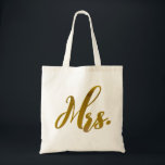 Mrs in Gold Foil Wedding Tote Bag<br><div class="desc">A gorgeous 'Mrs' Wedding gift Tote Bag for the lovely Bride to be. Or for those that have recently wed.
Natural Canvas tote with 'Mrs' boldly printed in gorgeous elegant gold foil.</div>