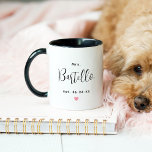 Mrs Personalised Black Script Last Name Wedding Mug<br><div class="desc">Custom Mrs. coffee mug for her features modern black script text that can be personalised with the newlywed bride's married last name and established wedding date. Includes a cute pink heart accent. Makes a special gift for the newly married Mrs!</div>