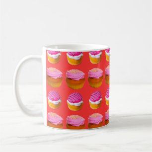 Muffins, cupcakes with white and pink cream on a r coffee mug