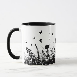 mug decorated with butterflies and flowers,