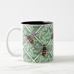 Mug with green foliage and bees