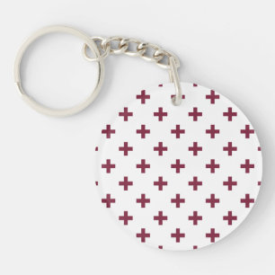 Mulberry polka crosses on white key ring