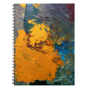 multi-coloured strokes of oil paint on the artist' notebook