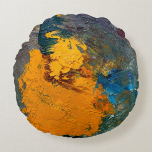 multi-coloured strokes of oil paint on the artist' round cushion