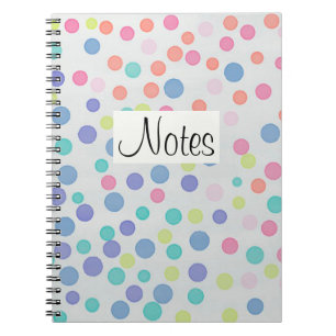 Multicolor dots on grey spiral notebook