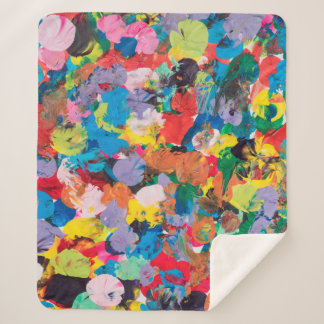 multicolor stained background made with paintbrush sherpa blanket