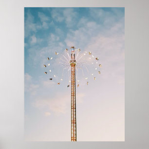 Multicolored amusement park ride under white cloud poster