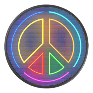 Multicolored neon peace sign symbol hockey puck