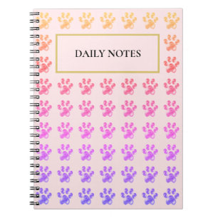 Multicolored Paw Pattern on Pink Notebook