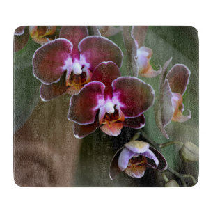 Multiple Branches of Purple Orchid Blossoms Cutting Board