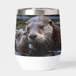 Mummy And Baby Otter Having A Cuddle In The River,