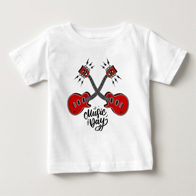 Music Day Baby T-Shirt ( A playful white t-shirt featuring two red guitars.)