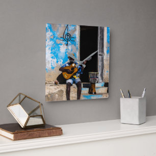 Music is the medicine of the mind square wall clock