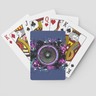 Music speaker and splattered paint playing cards
