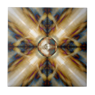 Music speaker on a gold cross background tile