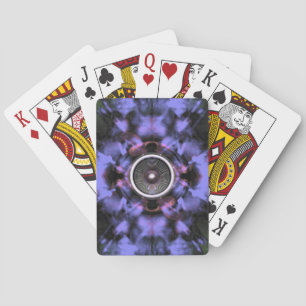 Music speaker on a purple background playing cards