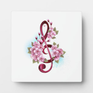 Musical treble clef notes with Sakura flowers Plaque