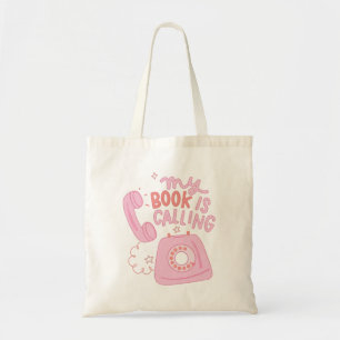 My book is calling  tote bag