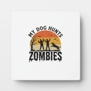 My Dog Hunts Zombies Vintage Halloween Dog Art_1 Plaque
