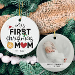 My first Christmas as mom with name and photo Ceramic Tree Decoration<br><div class="desc">Show your happiness for your first Christmas as a mom with this lovely first Christmas ornament decorated with a red Santa hat,  holly leaves,  and colorful Christmas lights. Easily customizable with the baby's name and date of birth and one of your favorite pictures on the reverse.</div>