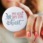 My Head Says Gym My Heart Says Knit - Knitters Fun 6 Cm Round Badge<br><div class="desc">Fun button badge with knitting humour. The knitting dilemna reads "my head says gym, my heart says knit". The design features a heart shaped ball of yarn with knitting needles and a little butterfly. The badge has a colour palette of grey-blue, pink and denim-blue. Please browse our store for matching...</div>