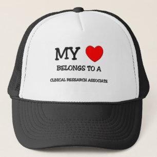 My Heart Belongs To A CLINICAL RESEARCH ASSOCIATE Trucker Hat