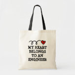 My heart belongs to an engineer cute canvas tote bag<br><div class="desc">My heart belongs to an engineer cute canvas Tote Bag. Funny Birthday gift idea for wife,  girlfriend,  partner etc. Red heart with fun text. Job and work related gift ideas. Office humour.</div>