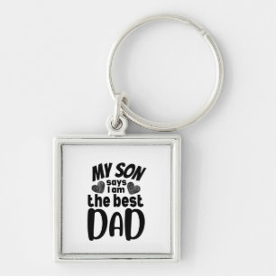 My son says I am the best dad- white background.pn Key Ring